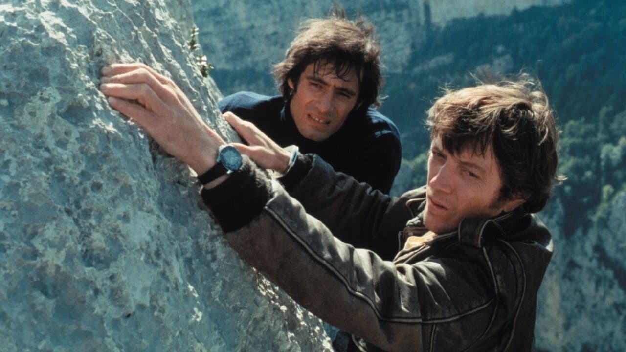 Les Spécialistes backdrop