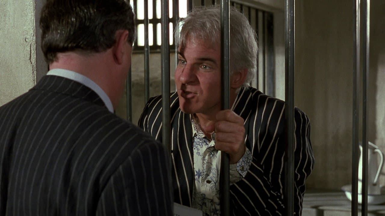 Le Plus Escroc des deux backdrop