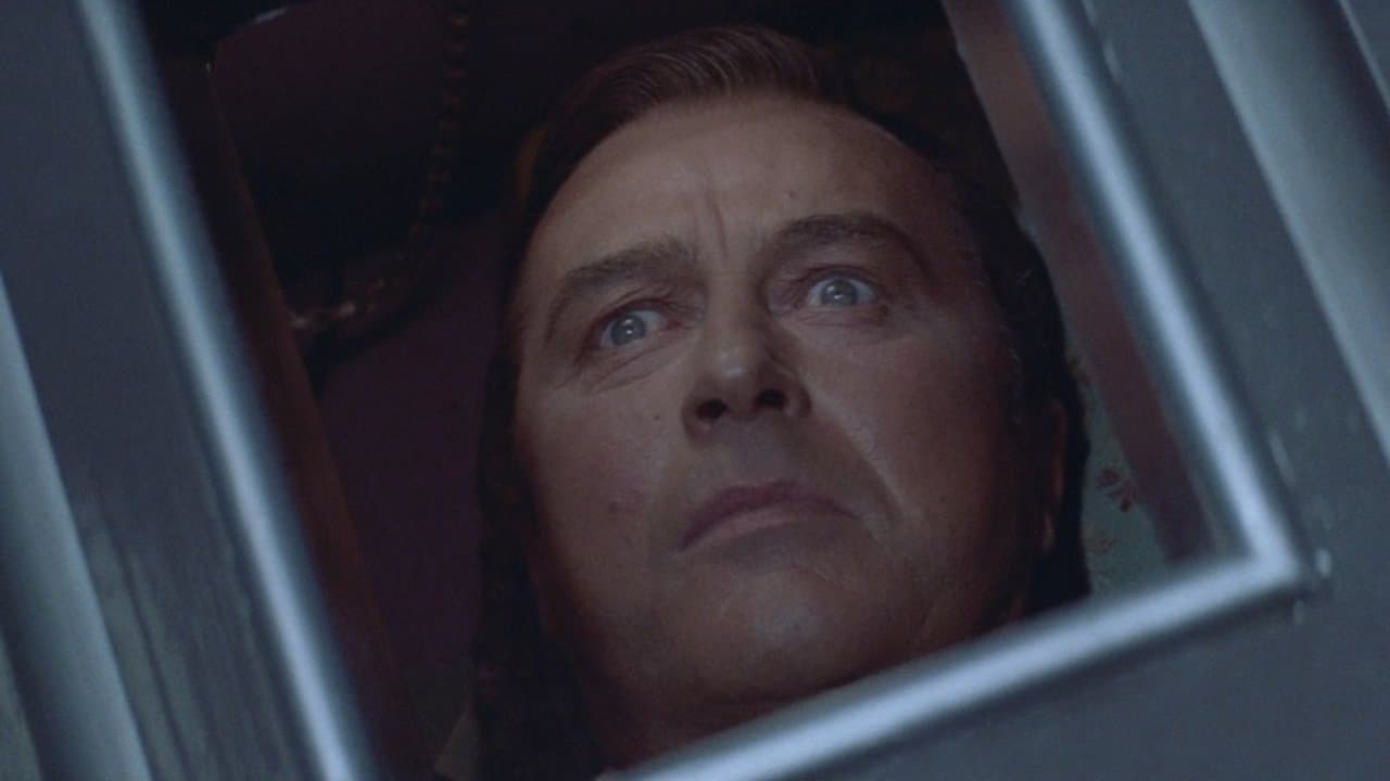 L'Enterré vivant backdrop