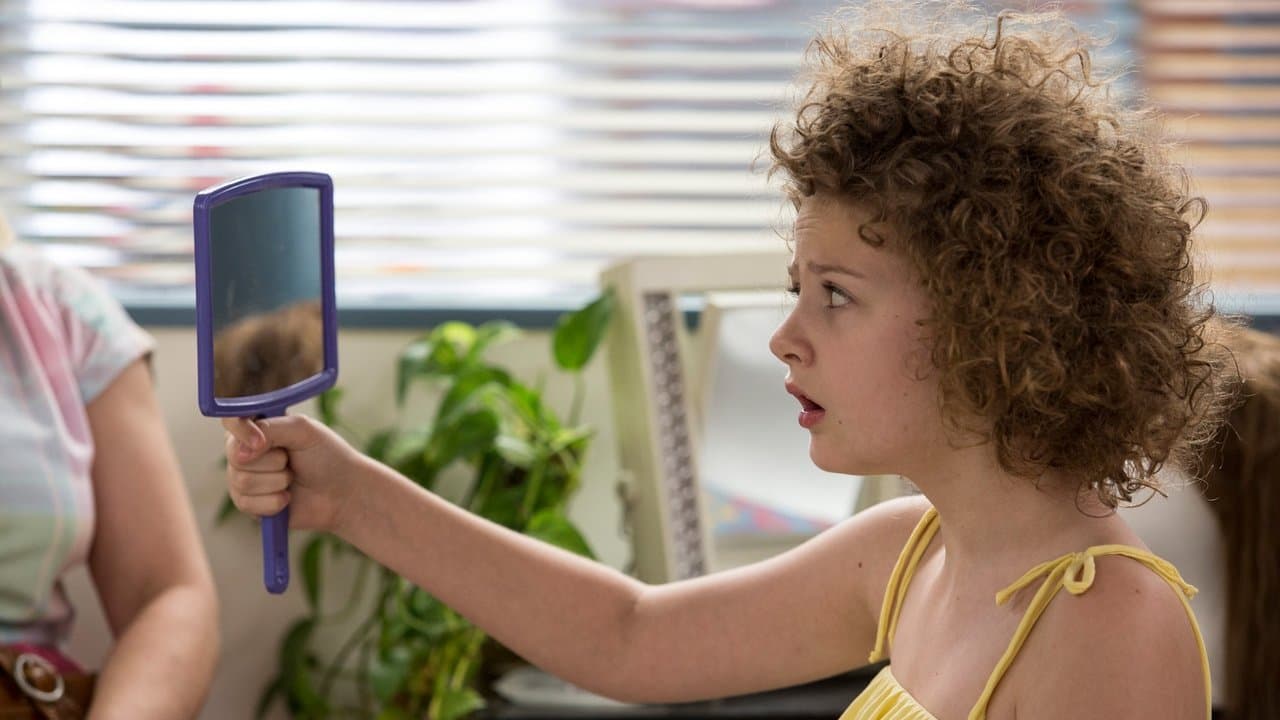 Bigoudis et Permanente backdrop