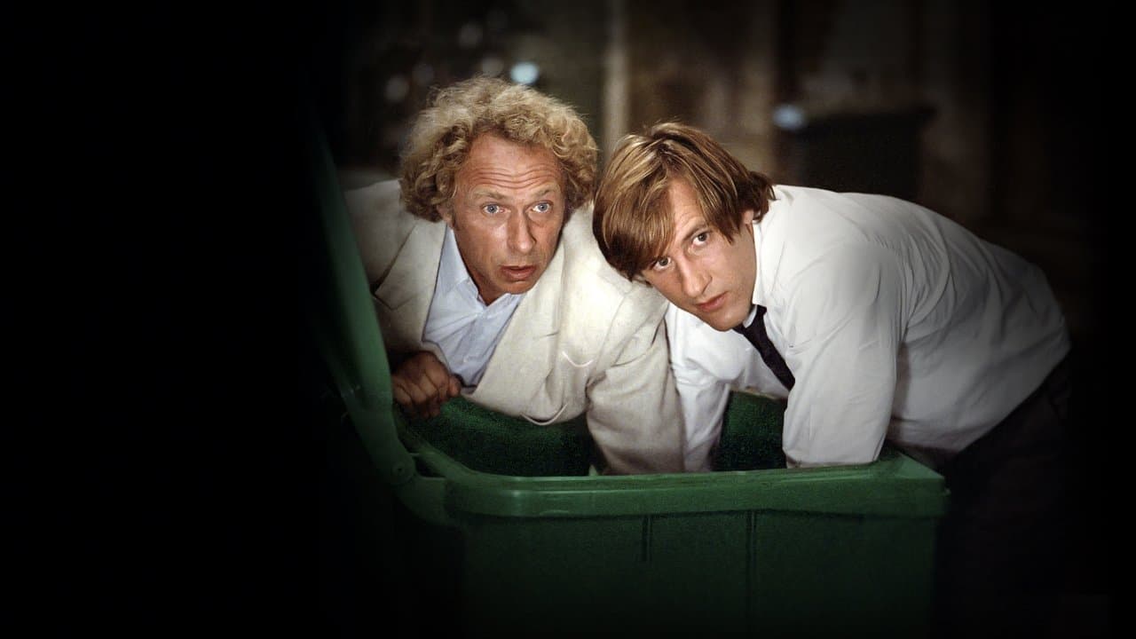 Les Compères backdrop