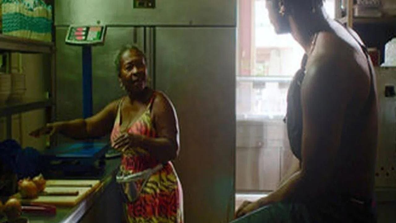 Tjenbé Red backdrop