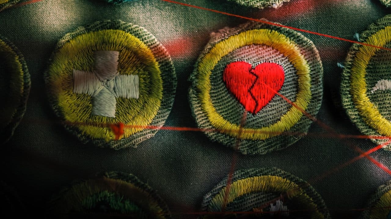 Paroles de scouts : Le malaise américain backdrop